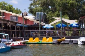 water front restaurant paddle boards kayaks electric boat rental