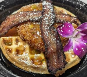 large waffle with chicken and bacon tropical bistro breakfast lunch ponce inlet florida